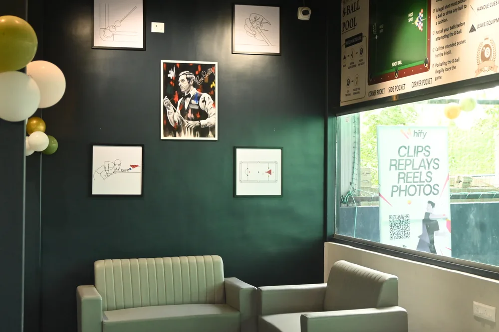 Club lounge seating and cue sports wall art
